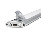 Silver LED under cabinet light with motion sensor attachment and USB charging port, product photo on white background.