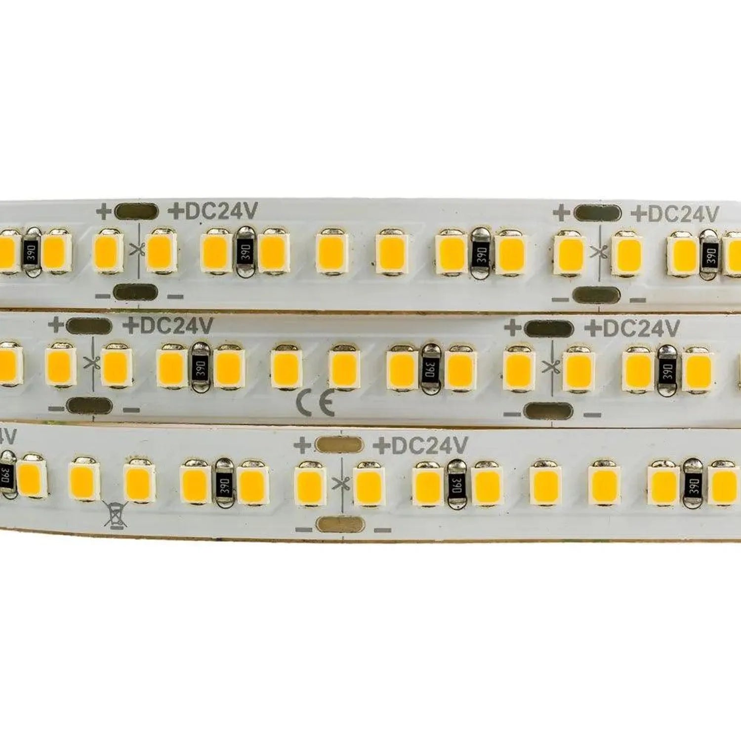Close-up of LED strip showing three parallel rows of yellow SMD2835 diodes with resistors on 24V DC flex circuit board.