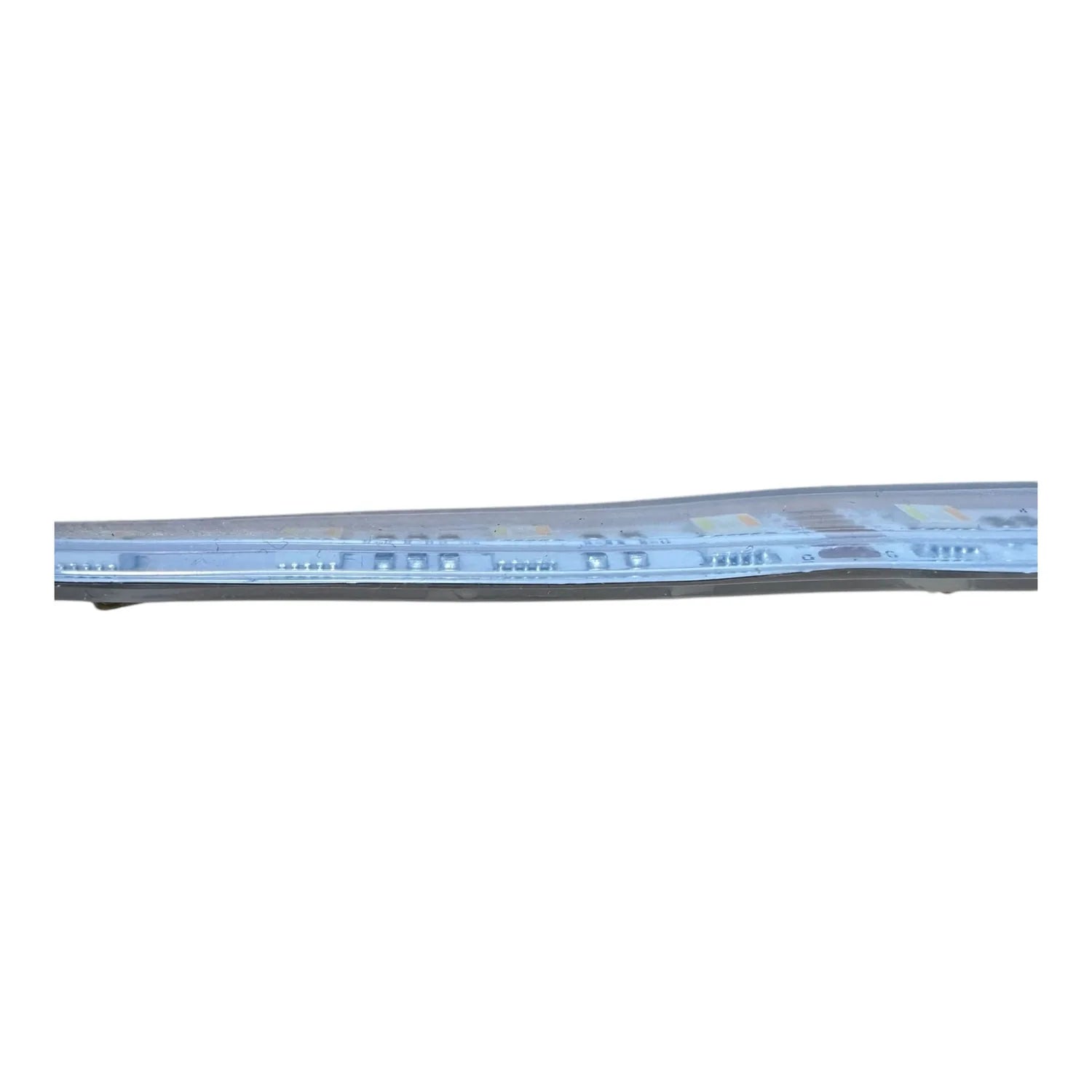 LED strip light showing blue illuminated pixels and control circuits on flexible PCB board, angled view.
