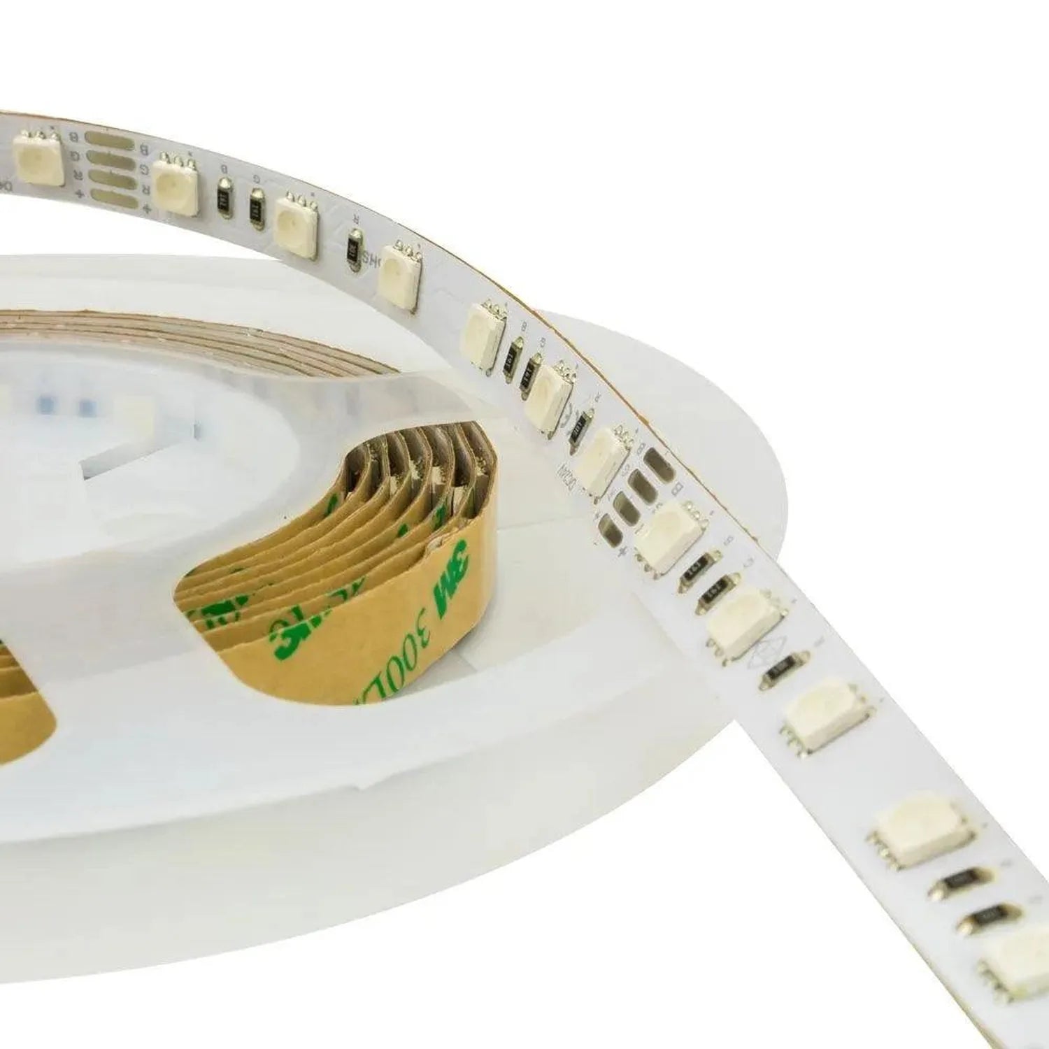 Coiled RGB LED strip light with adhesive backing and connector ports, displayed unrolled on white curved surface.