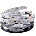 WRGB LED strip light coiled on black spool with control wires and connector modules visible
