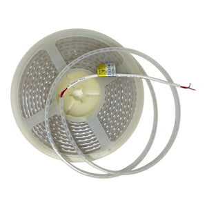 Coiled LED strip light with white casing, showing reel spool, clear tubing, and yellow safety label on white background.