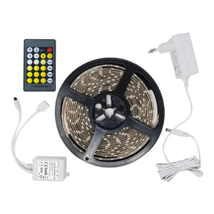 Smart WiFi LED strip light kit with remote controller, power adapter, and wireless receiver module displayed flat lay.