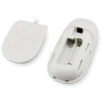 White remote control shown open and closed, displaying battery compartment with two metal contacts and internal circuitry det
