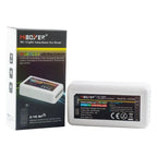 Mi-Light RGB+CCT LED Strip Controller FUT039 with packaging box and 2.4GHz RF remote control device displayed.