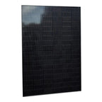 Black rectangular solar panel with vertical ribbed surface texture, photographed at an angle against white background.