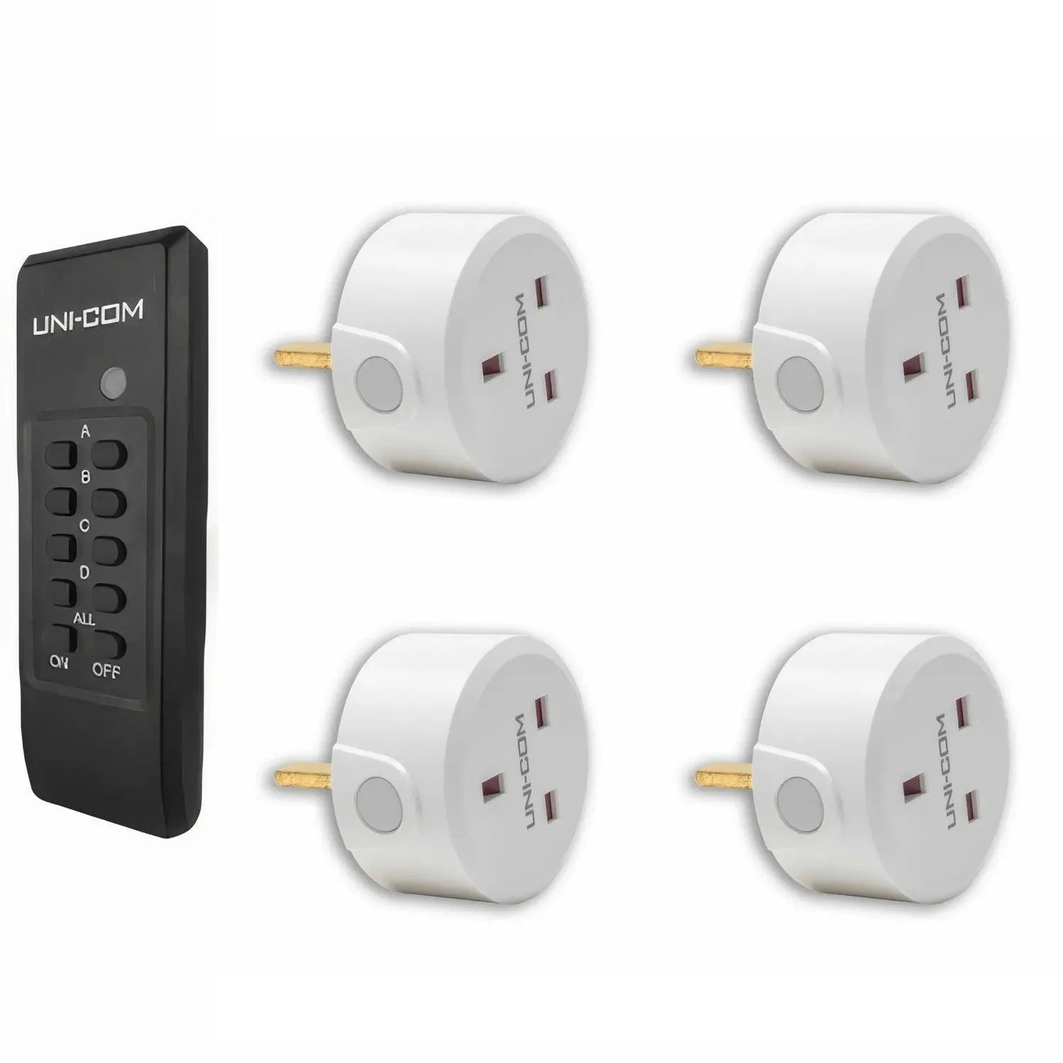 UNI-COM remote control kit with black transmitter and four white plug-in receiver sockets arranged in grid layout.