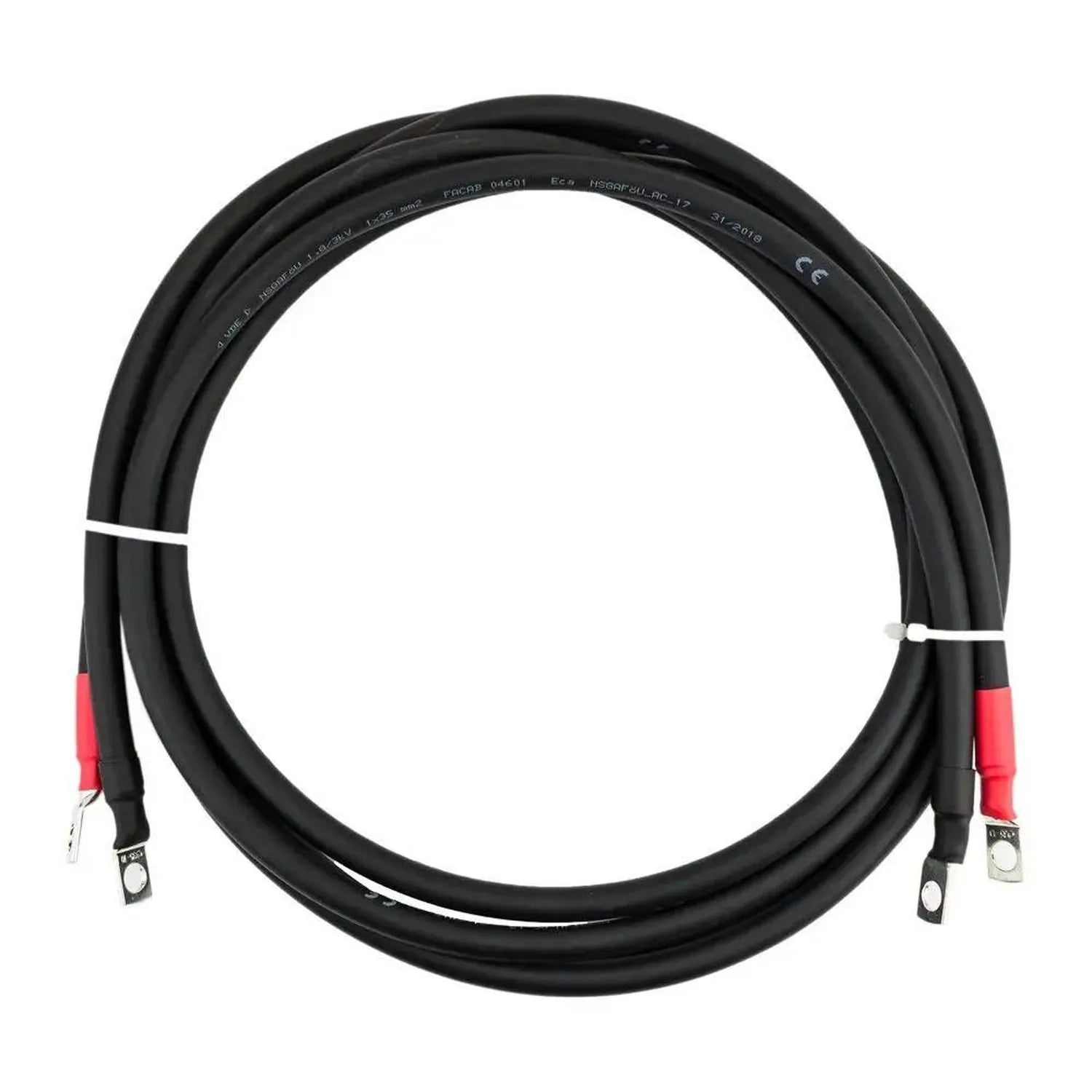 Coiled black battery cable pair with red connectors and crimped terminals on white background
