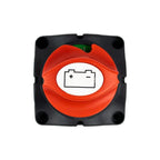 Battery disconnect isolator switch with red rotary knob marked with plus and minus symbols on black square housing, front vie