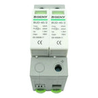 BENY BUD-40/2 dual-module surge protection device with green terminal connectors and LCD displays, front view.