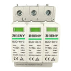 Three-module BENY BUD-40/3 DC surge protector with green indicator windows and screw terminal connectors labeled L+, neutral,