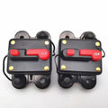 Two black waterproof circuit breakers with red manual reset switches labeled 60A and 40A, featuring yellow indicator lights a