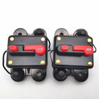 Two black waterproof circuit breakers with red manual reset switches labeled 60A and 40A, featuring yellow indicator lights a