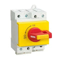 Yellow and red DC switch disconnector with ION and OFF markings, mounted on white DIN rail housing with terminal connections.