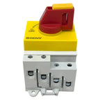 BENY DC PV switch disconnector with yellow base, red handle, and white DIN rail mounted terminals, product photo on white bac