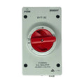BENY BYT-32 DC isolator switch with red handle in ON position, mounted on light gray weatherproof enclosure.