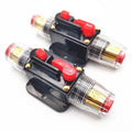 Three inline DC circuit breakers with red manual reset switches and gold terminals, rated 30A and 80A, displayed against whit