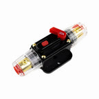 30A inline DC circuit breaker with red manual reset switch, clear terminal caps, and gold connectors on black housing.