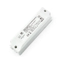 White rectangular LED driver with technical specifications and CE marking visible on label, mounting holes at each end.