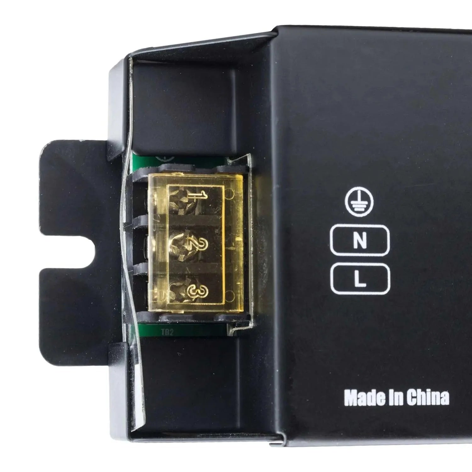 Interior view of black LED driver housing showing yellow relay component and green circuit boards labeled N and L terminals, 