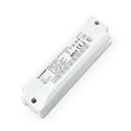 White rectangular LED driver unit with mounting holes and printed specifications label, angled product view.