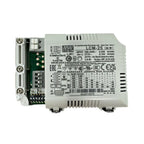 Meanwell LCM-25 LED driver unit showing front label and internal circuitry with terminal connections.