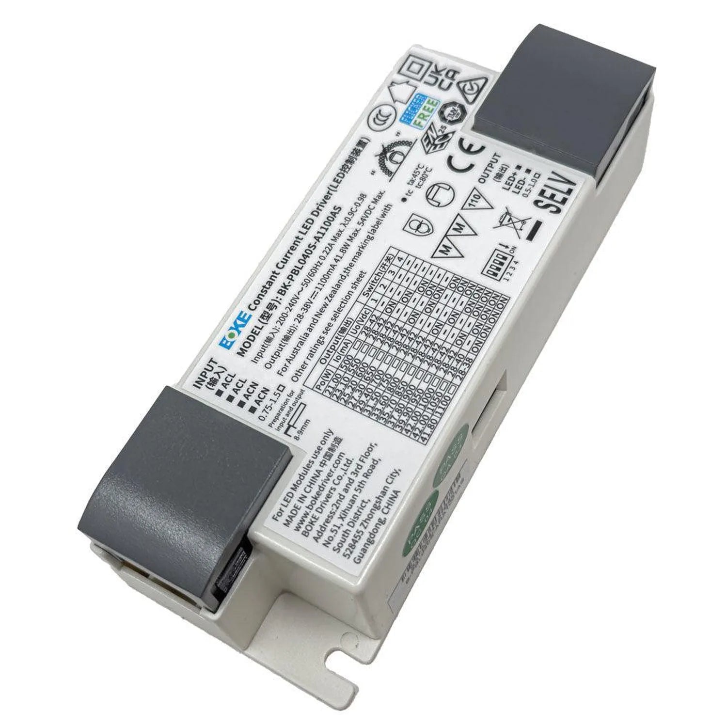 White rectangular LED driver with black end caps, showing technical specifications and regulatory certifications on label.