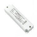 White rectangular LED driver with ribbed casing, CE marking, and technical specifications label visible on front.
