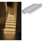 Left: LED stair nosing installed under stair treads providing warm accent lighting. Right: Product diagram showing aluminum p