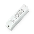White rectangular LED driver with product label and specifications visible, mounting holes at each end, angled product shot a