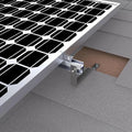 Solar panel mounting kit installed on slate and concrete tile roof, showing bracket assembly and attachment hardware detail.