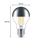 LED filament bulb with mirror top cap, 60mm diameter, 106mm height, showing warm white glowing filaments inside clear glass w