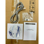 Unboxed solar inverter accessories on cardboard including gray power cable, installation manual, CD disc, and small hardware 