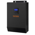 Voltacon 5kW power conversion inverter with blue LCD display and control buttons, wall-mounted installation shot.