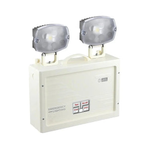 White dual-head emergency lighting unit with two rectangular LED spotlights mounted on top, control panel with Test, Charge, 
