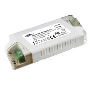 White rectangular LED power supply with green indicator light and metal connectors, showing model number and FCC certificatio