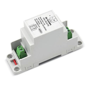 White DIN rail-mounted power supply module with green terminal connectors and product labeling visible on top surface.