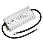 White rectangular LED driver with aluminum heatsink fins, black power cable with exposed colored wires, mounted on white back