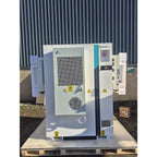 Pylontech A300 battery storage unit mounted on wooden pallet against corrugated metal backdrop, showing front panel with cool