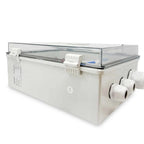White AC combiner box with transparent top cover, dual input connectors on right side, and single output port, product shot o
