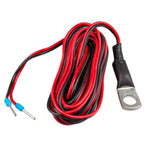 Red and black twisted cable with blue terminal connectors and metal ring lug terminal on right end.