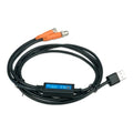Victron Lithium NG Service Tool with black cable, orange connectors at top, and USB connector at right end against white back