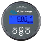 Victron Energy BMV-700 battery monitor displaying 12.89V on blue LCD screen with charge indicator and three control buttons b