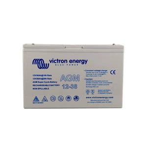 Victron Energy 12-38 AGM rechargeable battery with blue and white label showing specifications and safety warnings.