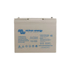 Victron Energy 12-100 AGM rechargeable battery, beige rectangular case with blue branding and safety icons.