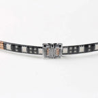 LED strip connector board showing transparent housing with copper contacts connecting two black circuit strips on white backg