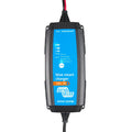 Victron Blue Smart 12V 7A waterproof battery charger with status indicator lights and mode button displayed against white bac