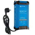 Victron Blue Smart charger in bright blue with black accents, shown with coiled black power cord and European plug attached.