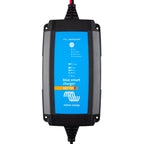 Victron Blue Smart 24V/13A waterproof battery charger with blue display screen showing mode and settings options.