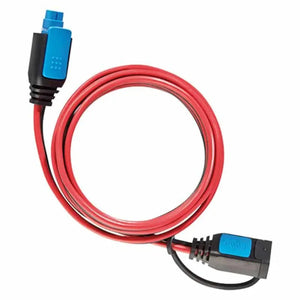 Red extension cable with blue connectors at both ends, coiled display against white background.